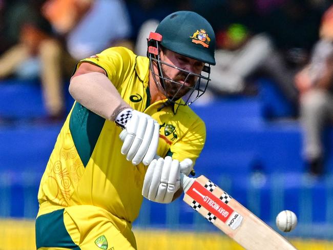 Australia's Travis Head plays a shot during the second and last one-day international (ODI) cricket match between Sri Lanka and Australia at the R. Premadasa International Cricket Stadium in Colombo on February 14, 2025. (Photo by Ishara S. KODIKARA / AFP)