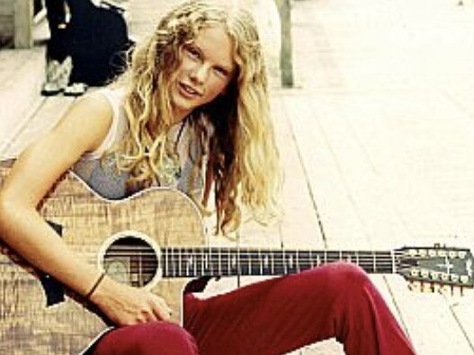 Taylor Swift, aged 13, the daughter of a broker.