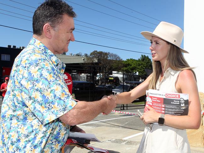 Housing Minister Meaghan Scanlon greeting voters at a polling centre in Nerang on Friday. Picture: Richard Gosling.