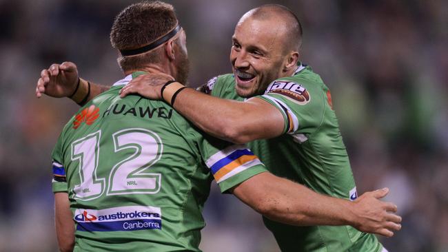 Elliot Whitehead celebrates a try with Raiders teammate Josh Hodgson. Picture: AAP