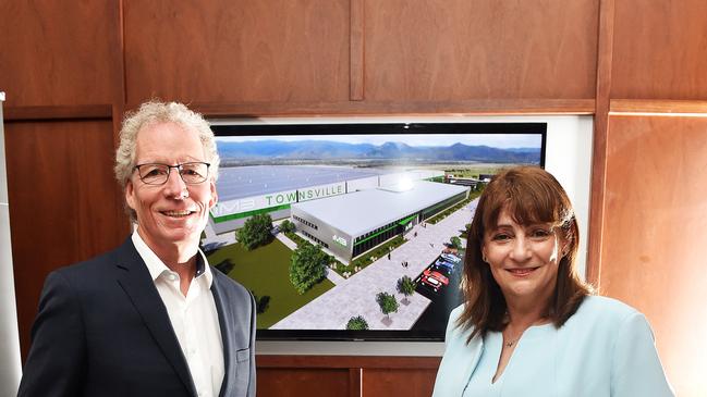 Mayor Jenny Hill with managing director of Magnis Energy Technologies Marc Vogts in front of an artist's impression of the new battery plant. Picture: Zak Simmonds