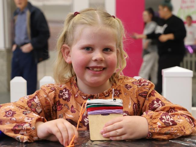 Hazel Reedman, 7, at Rose City's DIY pom pom beanie event (Photo: Zilla Gordon).