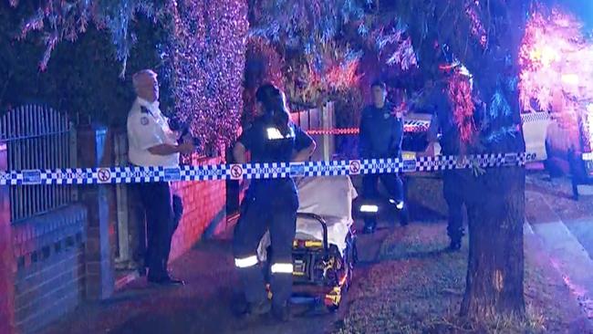 Paramedics attend a home on Sydenham Rd, Marrickville, following reports of a stabbing. Two people have been taken to hospital. Picture: TNV