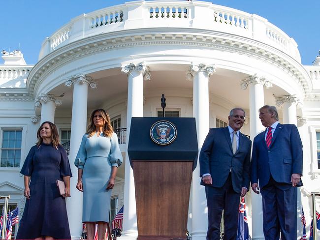 US President Donald Trump and First Lady Melania Trump stand at attention with Australian Prime Minister Scott Morrison and his wife Jenny Morrison during an Official Visit by the Australian PM at the White House in Washington, DC. Picture: AFP