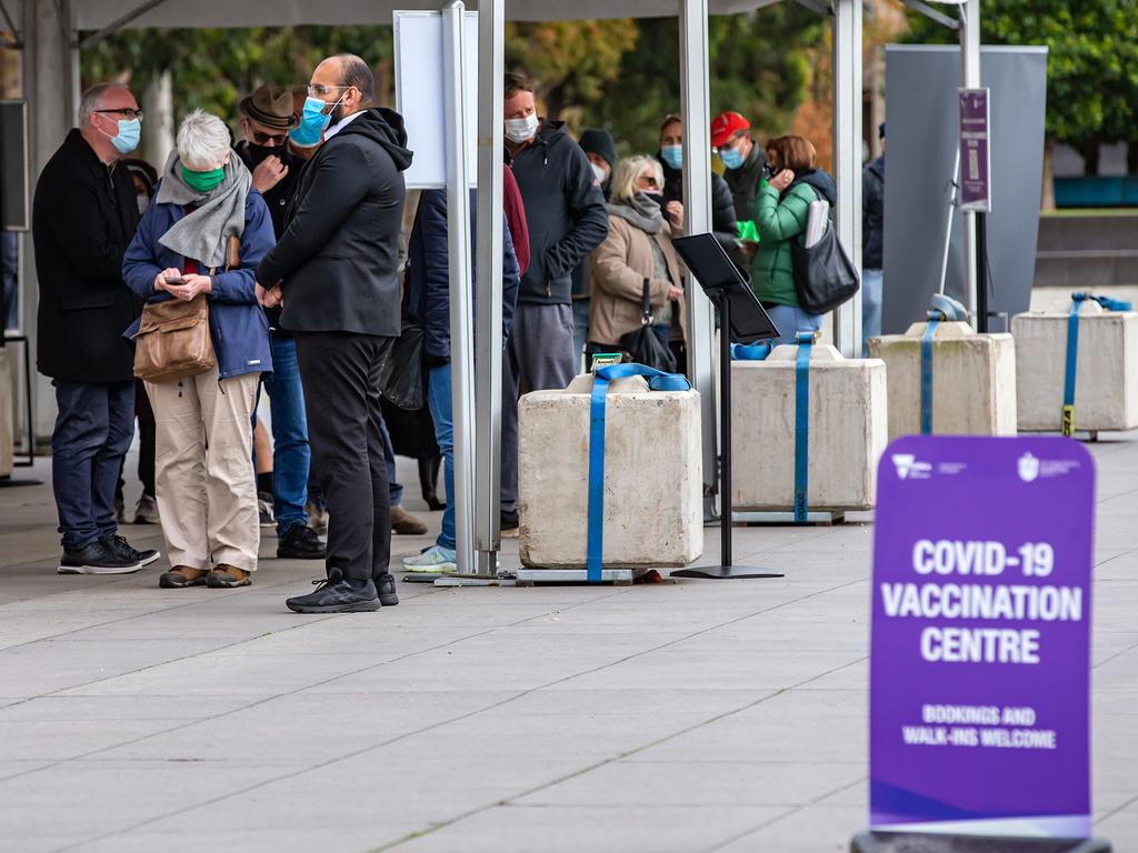 People waiting at the Royal Exhibition Building vaccination hub at Carlton Picture: NCA NewsWire / Sarah Matray