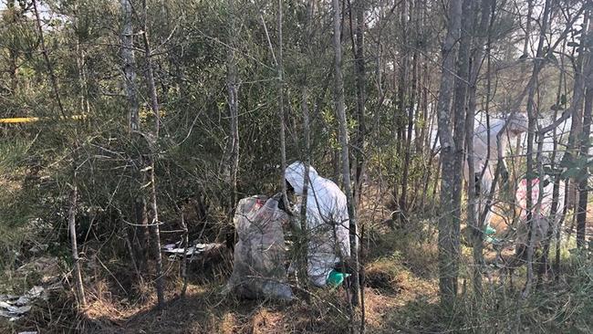 Fire and Rescue NSW Tweed Heads geared up in hazmat suits to remove asbestos illegally dumped in the Tweed. Picture: Fire and Rescue NSW Tweed Heads