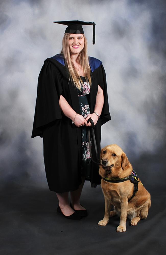 Kyra Domrow and her dog Esme at the USC graduation ceremony.