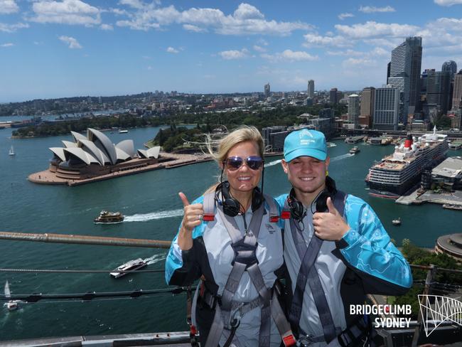 Bridgeclimbers from Indiana Christy Conaway and her son Oliver, 17, enjoy the view. Picture: Supplied