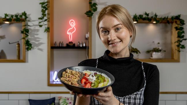 Marija Radmilovic holding a Mother Earth (Berry blend) dish at her family’s cafe Pod6 Coffee. Picture: Jerad Williams