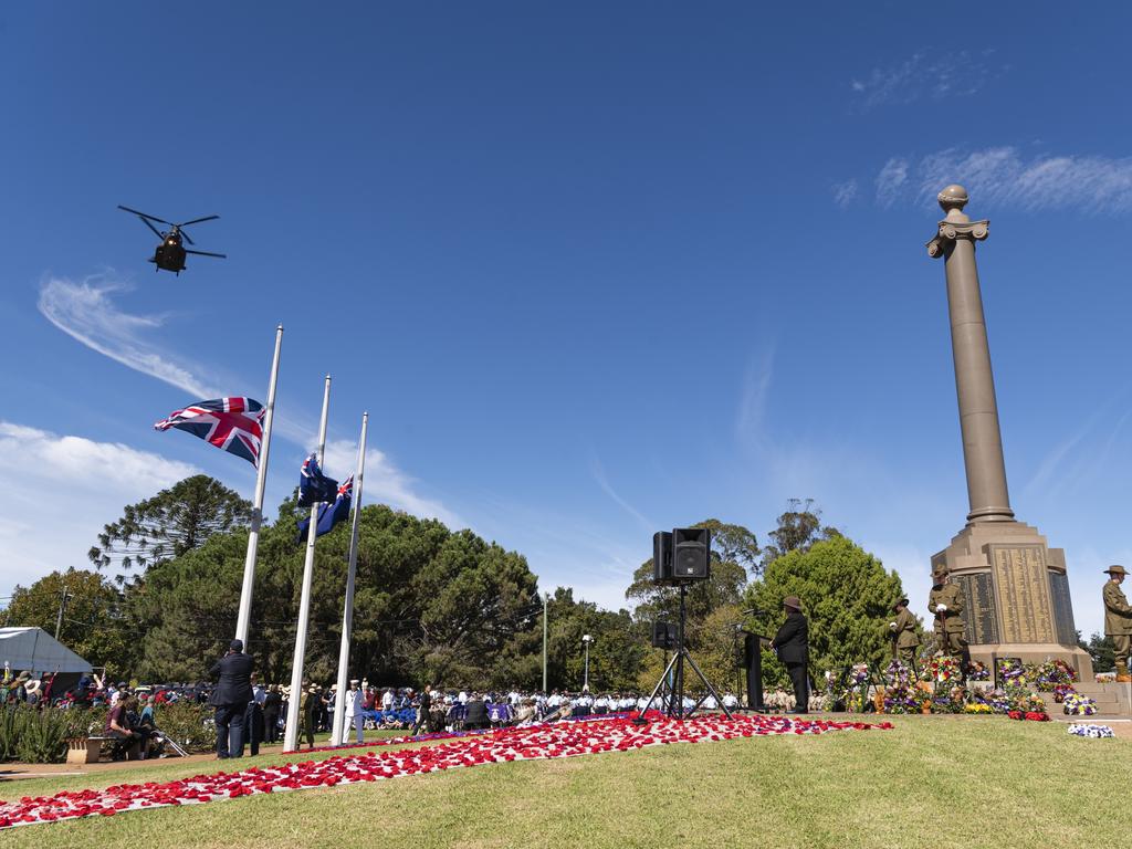 A Chinook helicopter is part of a fly-past over Toowoomba's Anzac Day mid-morning service at the Mothers' Memorial, Thursday, April 25, 2024. Picture: Kevin Farmer