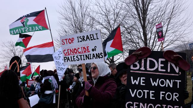 Palestinian supporters protest outside while Joe Biden speaks to members of the United Auto Workers in Warren, Michigan, on Thursday. Picture: AFP