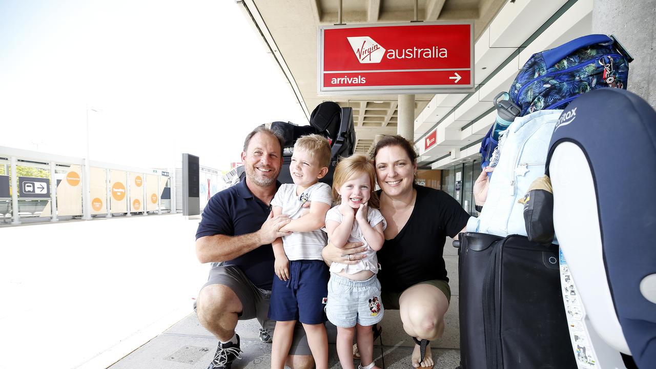 Geoff, Danielle, James and Olivia Izod arriving in Brisbane from Sydney this week. Picture: Josh Woning