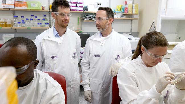 University of Queensland researchers Dr Keith Chappell with Professor Trent Munro, who are part of a team working on a COVID-19 vaccine. Photo: Steve Pohlner