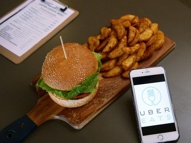 Uber Eats, the home delivery food app, may be set to launch in Tasmania. Picture: AAP/CARMELA ROCHE