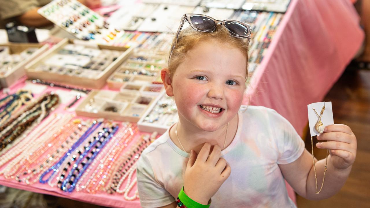 Aaliyah Watt with her shell pendant won as a lucky door prize at Gemfest hosted by Toowoomba Lapidary Club at Centenary Heights State High School, Saturday, October 19, 2024. Picture: Kevin Farmer