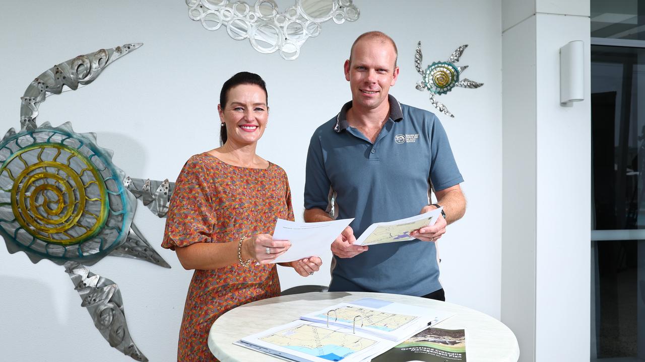 The Queensland Government has released a draft of its new Crocodile Management Plan, updating existing zones from six to four different categories. Queensland Environment Minister Leanne Linard and Department of Environment and Science program co-ordinator for wildlife research and monitoring Simon Booth look over the draft papers for the plan, which is open to public consultation until June 5. Picture: Brendan Radke