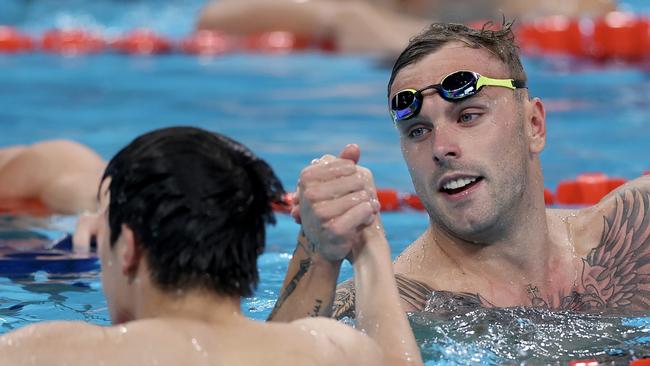 Kyle Chalmers celebrates with Zhanle Pan. Picture: Maddie Meyer/Getty Images