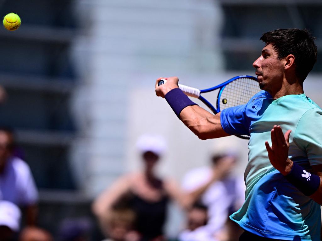 Popyrin plays a forehand return against Borges. Picture: Julien de Rosa / AFP