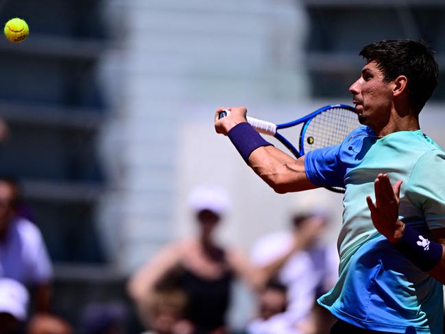 Popyrin plays a forehand return against Borges. Picture: Julien de Rosa / AFP