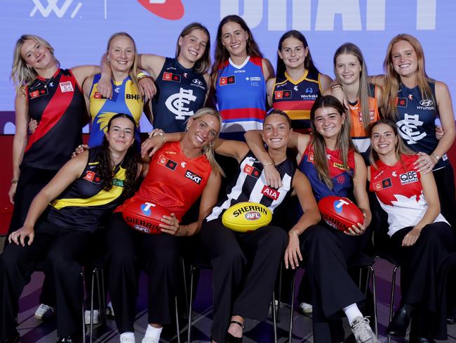 MELBOURNE, AUSTRALIA - DECEMBER 16: First round picks (Top Row L-R) Grace Belloni of the Bombers, Lucia Painter of the Eagles, Poppy Scholz of the Blues, Emma McDonald of the Bulldogs, India Rasheed of the Crows, Sara Howley of the Giants, Sophie McKay of the Blues, (Bottom Row L-R) Sierra Grieves of the Tigers, Havana Harris of the Suns, Ash Centra of the Magpies, Molly O'Hehir of the Demons and Zipporah Fish of the Swans pose during the 2024 Telstra AFLW Draft at Marvel Stadium on December 16, 2024 in Melbourne, Australia. (Photo by Dylan Burns/AFL Photos via Getty Images)