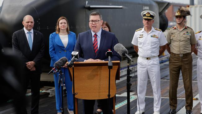 Defence Industry Minister Pat Conroy (centre) announces the Ghost Shark progran, which will provide long-range autonomous undersea warfare capability. Picture: Department of Defence