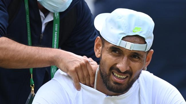 Kyrgios received treatment on a shoulder complain during his victory over Nakashima. Picture: AFP