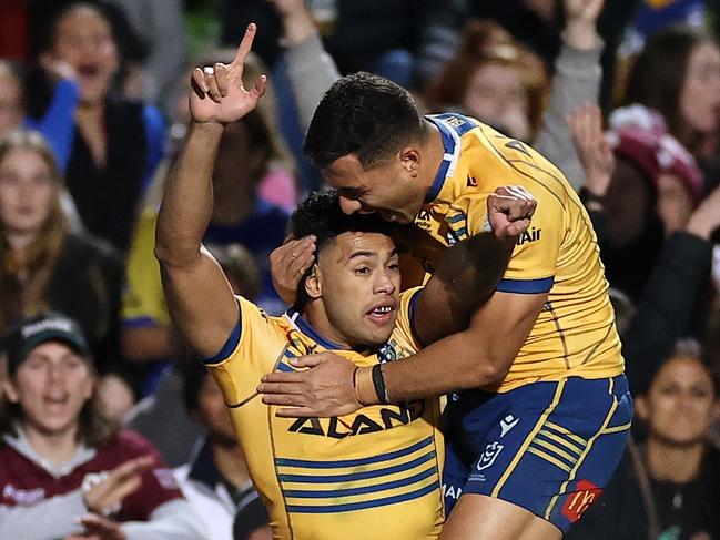 SYDNEY, AUSTRALIA - AUGUST 05: Waqa Blake of the Eels celebrates with team mates after scoring a try during the round 21 NRL match between the Manly Sea Eagles and the Parramatta Eels at 4 Pines Park on August 05, 2022, in Sydney, Australia. (Photo by Cameron Spencer/Getty Images)