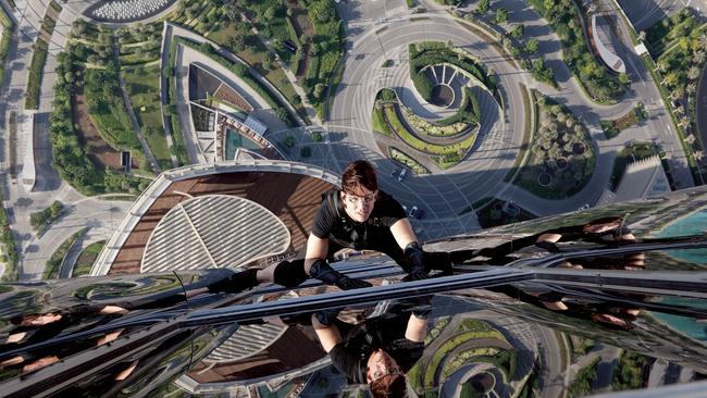 Tom Cruise climbs the outside of the Burj Hotel in Dubai in a scene from film Mission: Impossible - Ghost Protocol