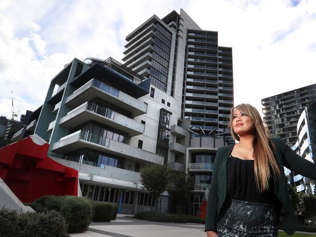 07/04/2017 Real estate agent Mariecris Tagala near appartment buildings in Docklands. In MelbourneÕs CBD, Docklands and Southbank more than half of the new  wave of apartments bought off the plan since 2011 have changed hands at a lossPicture: David Geraghty / The Australian.