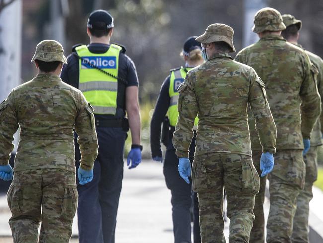 MELBOURNE, AUSTRALIA - NewsWire Photos JULY 25, 2020: Victorian Police and Australian Defense force members patrol Melbourne. Pictured in Macarthur St.   Picture: NCA NewsWire / Sarah Matray