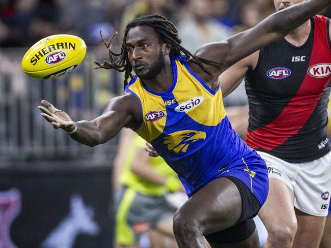 Nic Naitanui of the Eagles contests the ball during the Round 14 AFL match between the West Coast Eagles and the Essendon Bombers at Optus Stadium in Perth, Thursday, June 21, 2018. (AAP Image/Tony McDonough) NO ARCHIVING, EDITORIAL USE ONLY