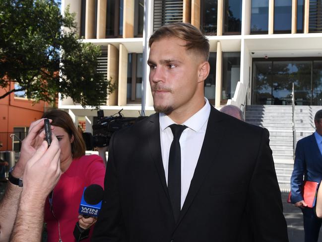 St. George Illawarra Dragons player Jack de Belin (centre) has broken his silence after being stood down by the NRL. Picture: AAP Image/Dean Lewins