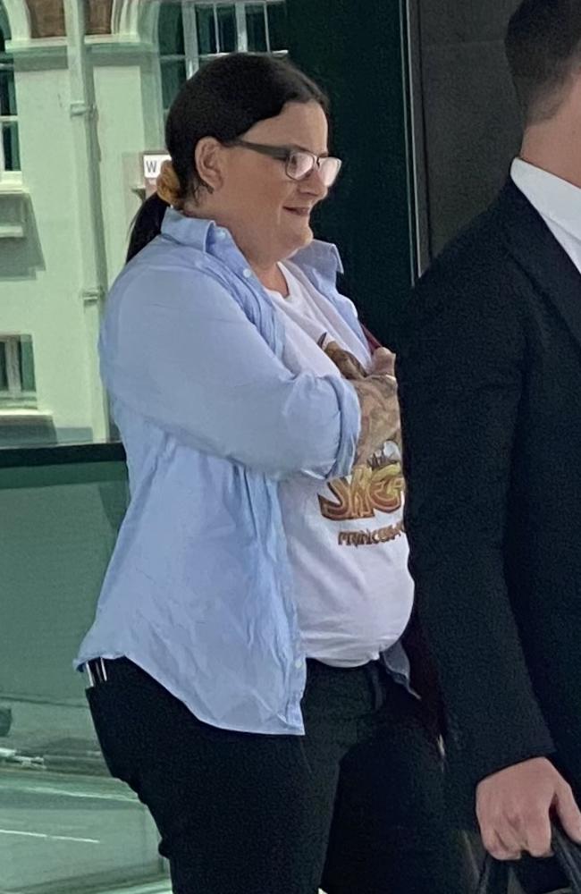 Hayley Jane Mackenzie, 39, of Cannon Hill leaves the Brisbane Magistrates Court on Monday, December 12, 2022. Picture: Jessica Baker