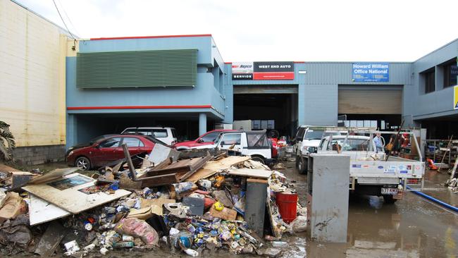 Carnage outside of West End Autos following the floods.