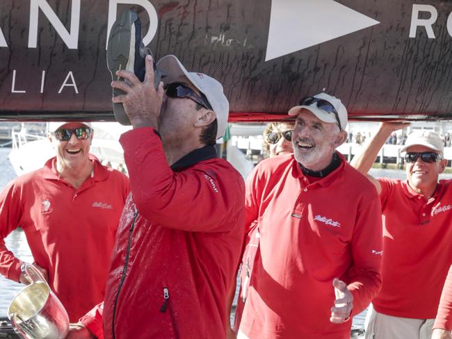 Wild Oats XI skipper Mark Richards celebrates the win with a ‘shoey.’ Picture: Getty Images