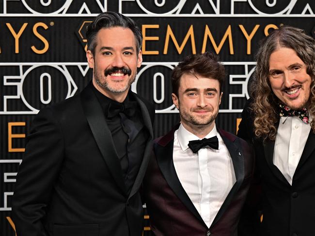 US filmmaker Eric Appel, British actor Daniel Radcliffe and US musician Al Yankovic. Picture: AFP