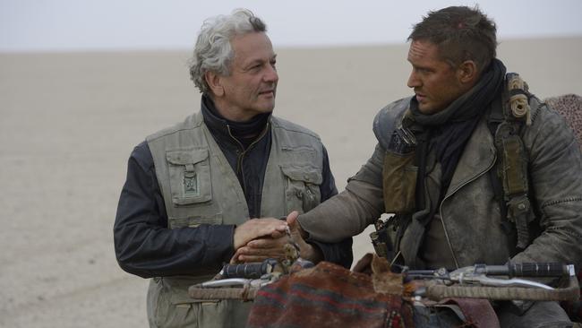 Director George Miller and Tom Hardy on set for Mad Max: Fury Road.