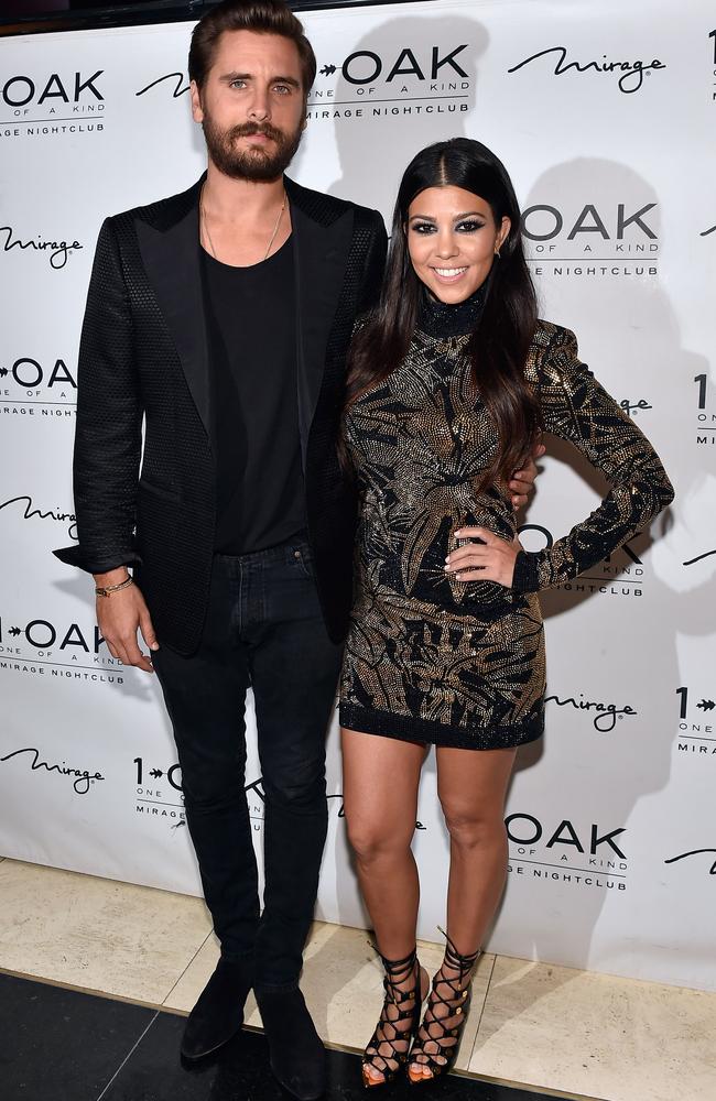 Killer curves ... Kourtney Kardashian, right, with boyfriend Scott Disick in Las Vegas last month. Picture: David Becker/WireImage