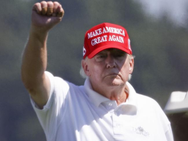 STERLING, VIRGINIA - SEPTEMBER 13: Former U.S. President Donald Trump gestures while golfing at Trump National Golf Club September 13, 2022 in Sterling, Virginia.   Win McNamee/Getty Images/AFP