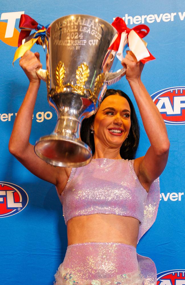 Katy Perry holds the Premiership Cup aloft. Picture: Nadir Kinani