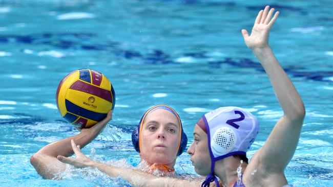 Gold Coast player with the ball. Gold Coast V UQWPC Barracudas Sunday November 28, 2021. Picture, John Gass