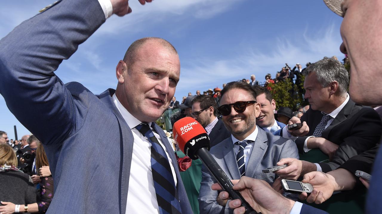 Rosemont Stud principal Anthony Mithen and co-owner Nigel Austin soak up Runaway’s 2018 Geelong Cup win. Picture: Alan Barber