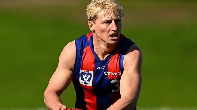 MELBOURNE, AUSTRALIA - JULY 17: Eli Templeton of the Borough takes possession of the ball during the round 16 VFL match between Port Melbourne and Collingwood at ETU Stadium on July 17, 2022 in Melbourne, Australia. (Photo by Morgan Hancock/AFL Photos/via Getty Images)