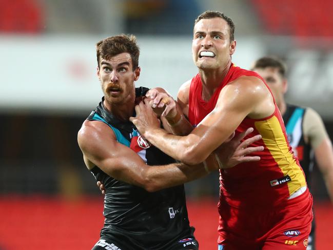 Jarrod Witts of the Suns and Scott Lycett of the Power compete for the ball during the round 1 AFL match between the Gold Coast Suns and the Port Adelaide Power at Metricon Stadium on March 21. Picture: Chris Hyde/Getty Images