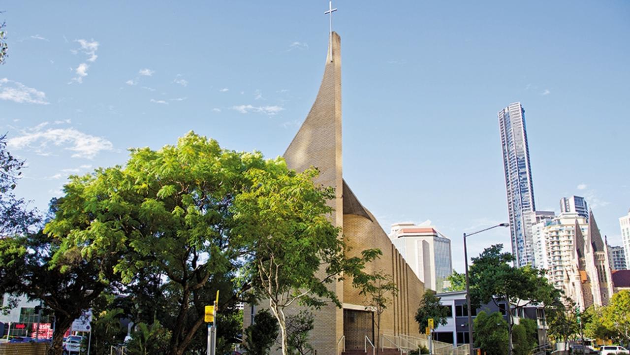 This cross high atop of the spire of the St Andrew's Lutheran Church in Brisbane would never be allowed in Noosa. Pic: Caitlin Nayanar