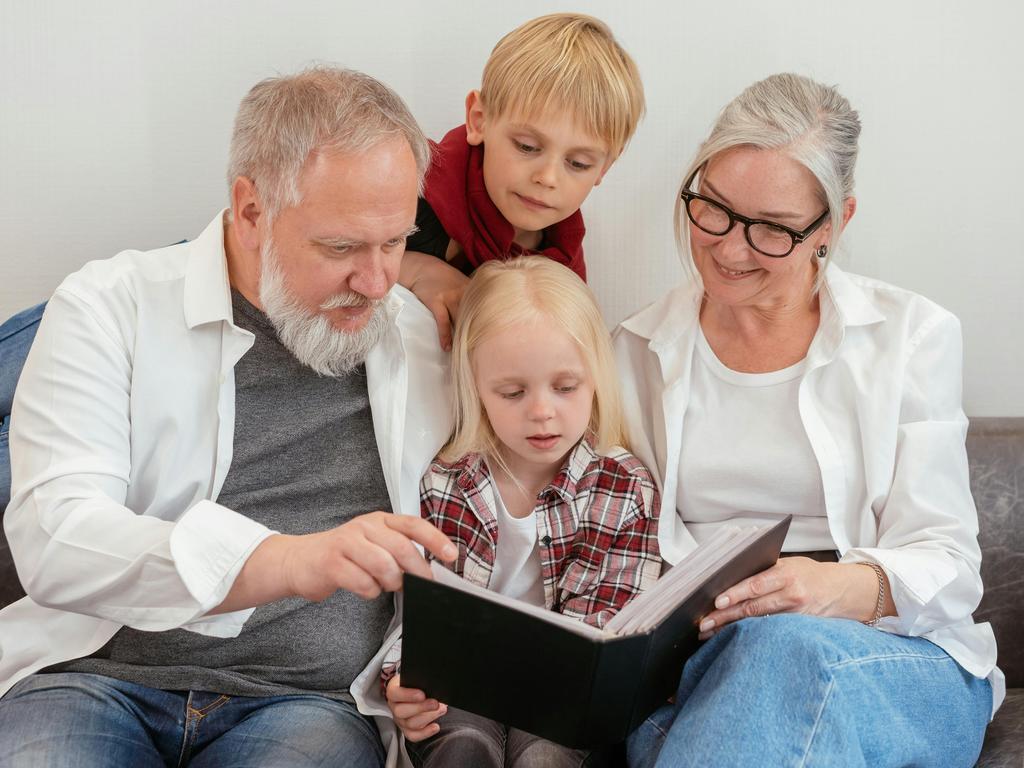 Creating a life story book for a loved one with dementia may help to connect with them and keep their story alive. Picture: Mikhail Nilov