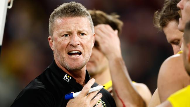 MELBOURNE, AUSTRALIA - MAY 20: Damien Hardwick, Senior Coach of the Tigers addresses his players during the 2023 AFL Round 10 match between the Essendon Bombers and the Richmond Tigers at the Melbourne Cricket Ground on May 20, 2023 in Melbourne, Australia. (Photo by Dylan Burns/AFL Photos via Getty Images)