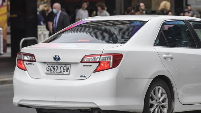 An unrelated private vehicle for hire is seen in Adelaide CBD. Picture: NCA NewsWire / Roy VanDerVegt