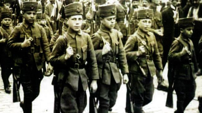 Defending home soil ... Turkish boy soldiers marching off to war.