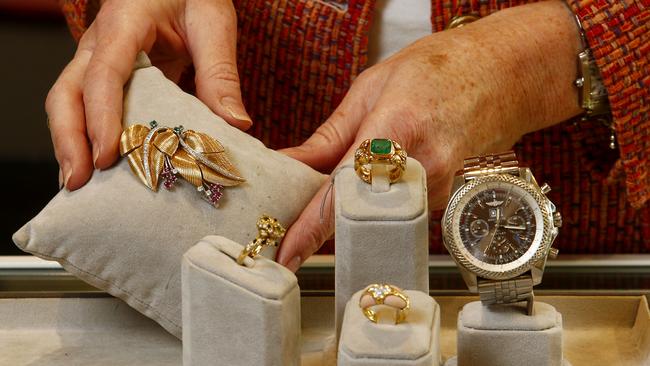 Jewellery specialist Fiona Frith holds items from the auction. Picture: John Appleyard